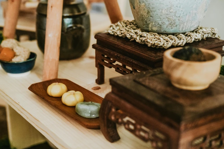 an arrangement of miniature objects sitting on the table