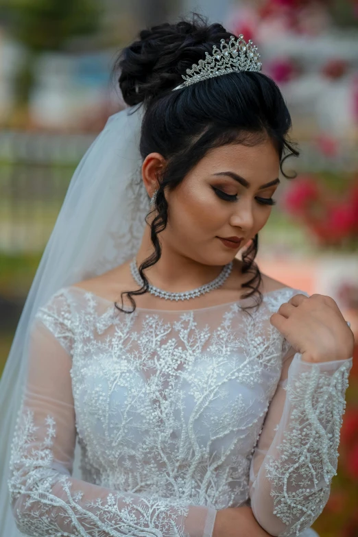 a beautiful bride poses for a wedding po