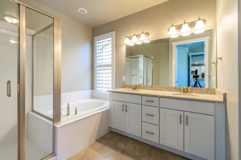 a very nice bathroom with an interesting bathtub and large mirror