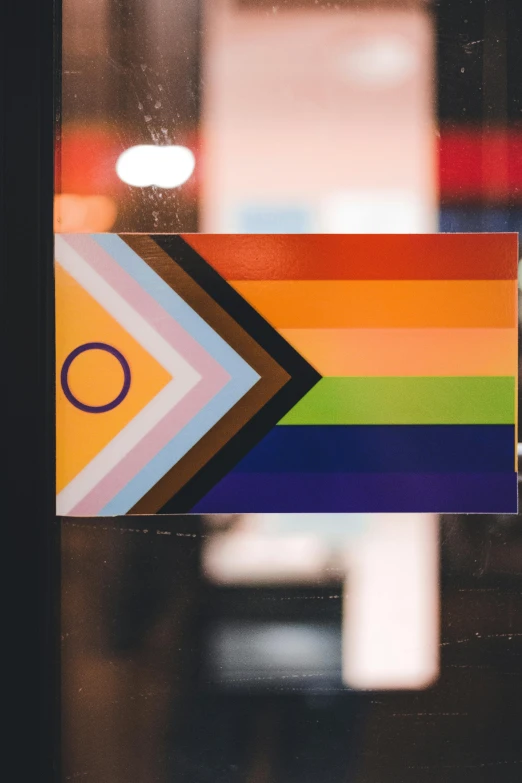 a colorful sticker depicting the city in rainbows