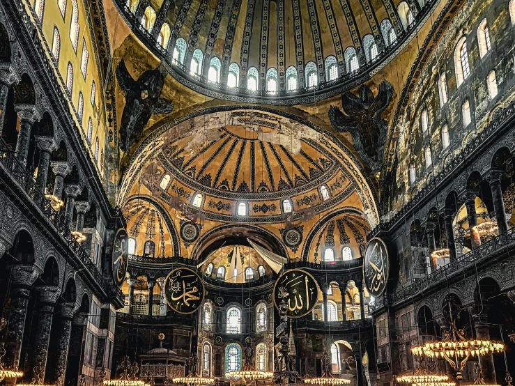 the inside of an ornate building with lights