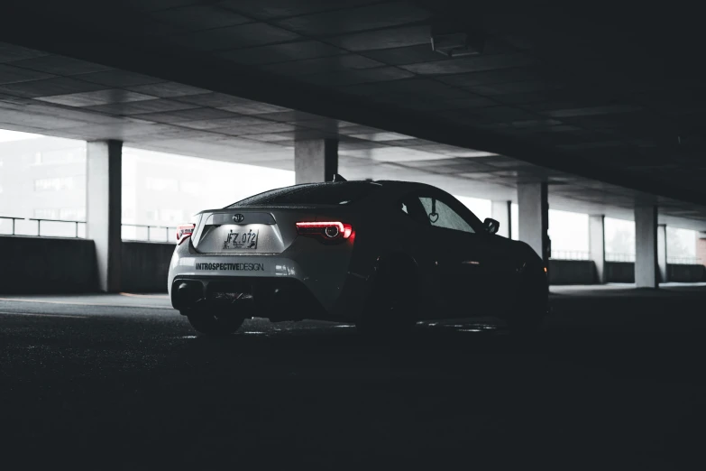 a car parked in the tunnel and the door open