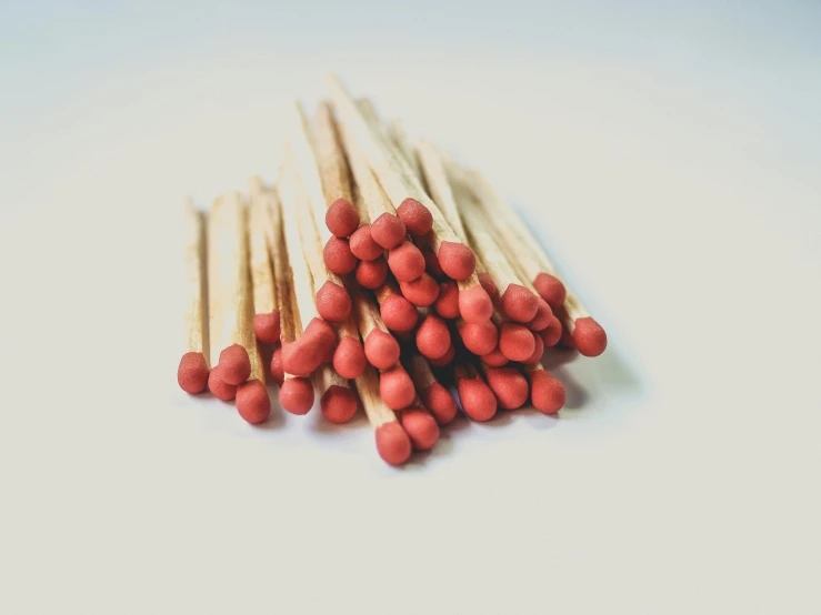a pile of matches are placed next to each other