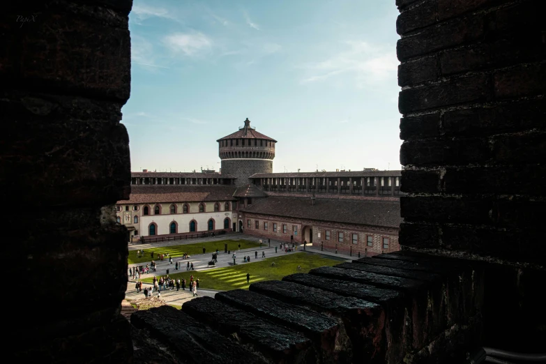 the view from inside an inner courtyard at a palace