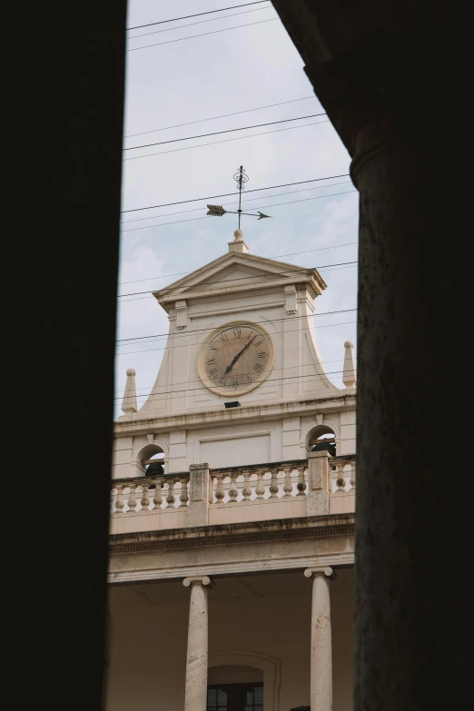 a clock tower at the top of an old building