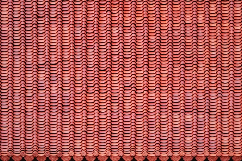 the pattern shows red wavy patterns on the roof