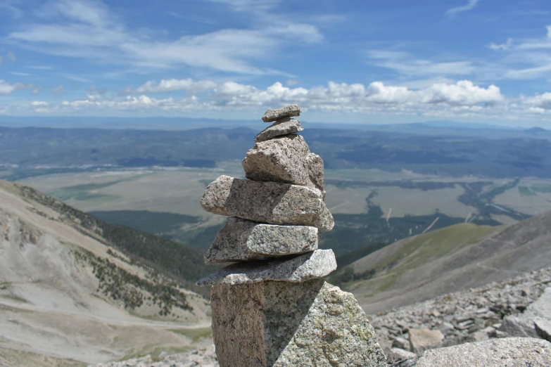 some rocks stacked up on top of each other