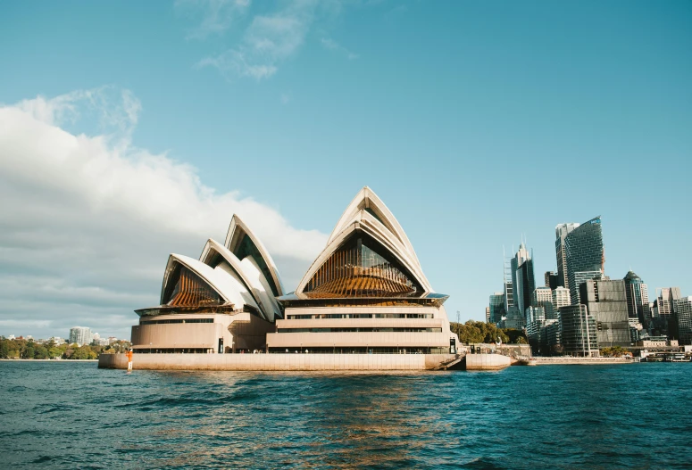 a water - side view of the opera house in sydney