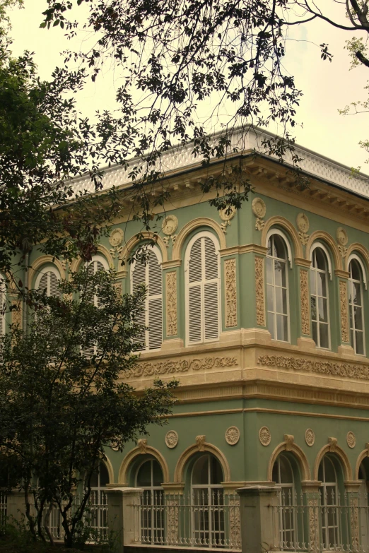 the front of a building in an old looking city