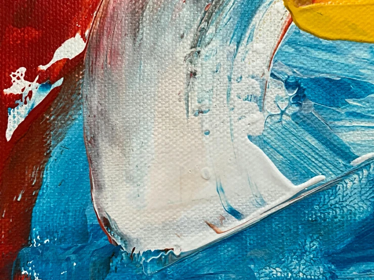 closeup view of a painting in red, blue, and yellow