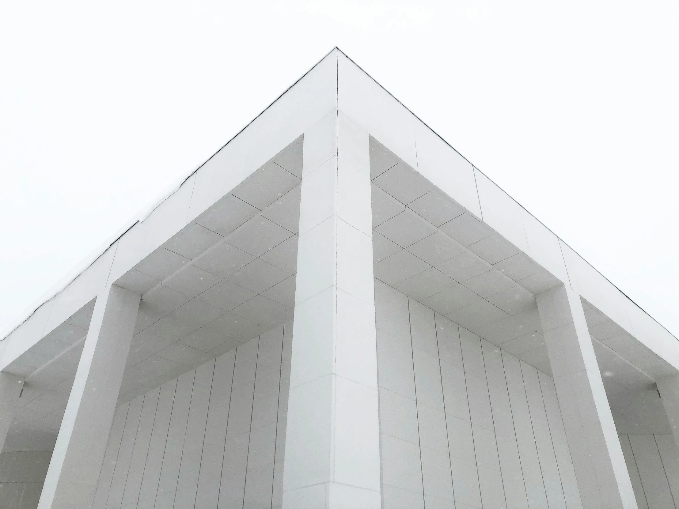 a white building with lots of windows on it