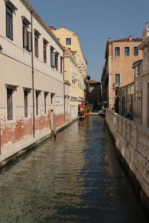 a street with buildings and the water is full