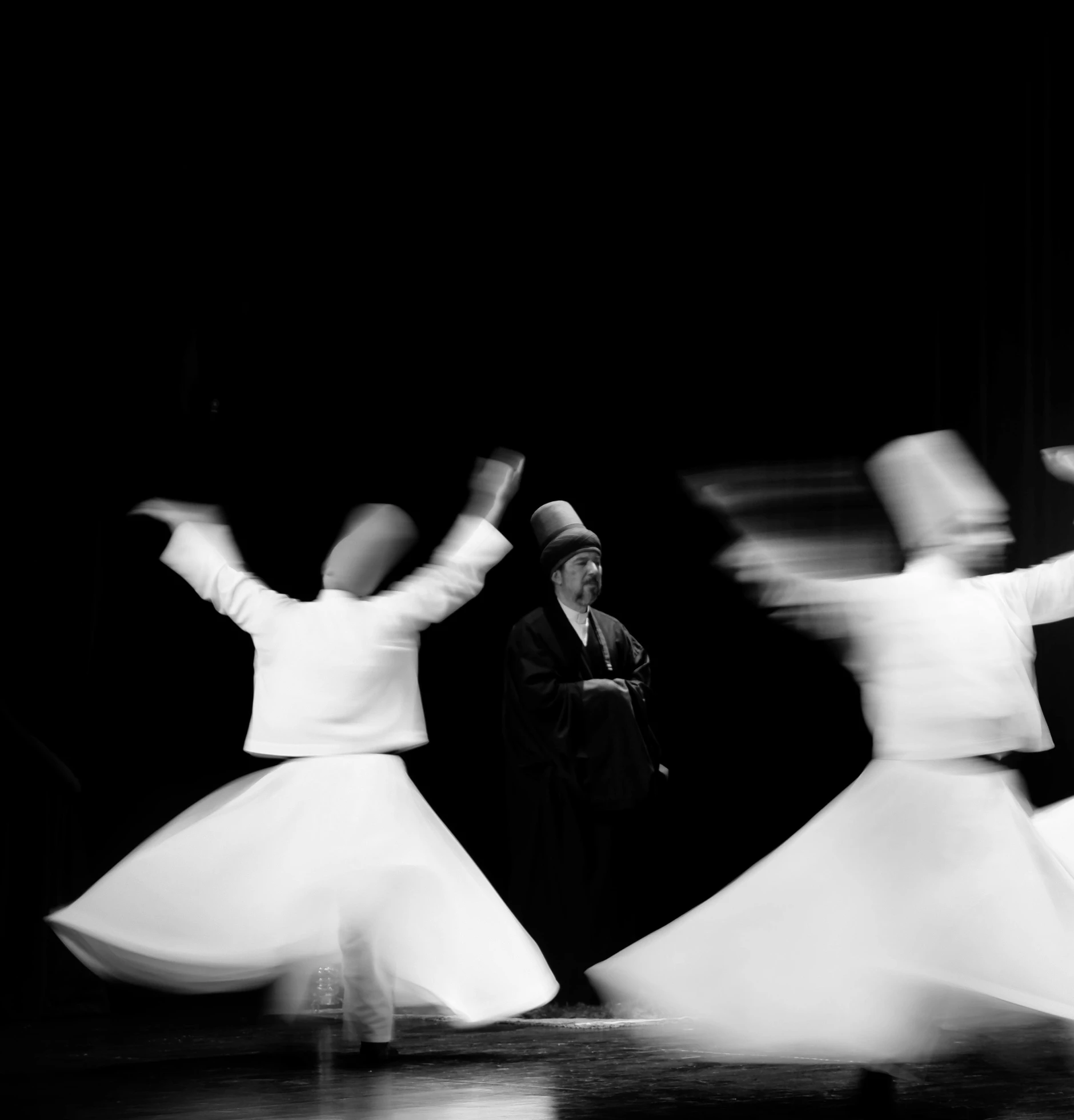 black and white pograph of a man and a woman dancing