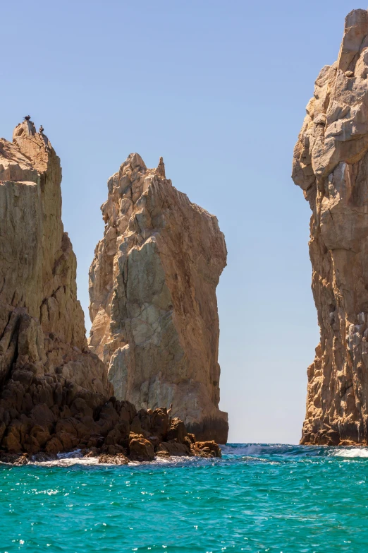 large rocks and rocks in the ocean near the beach