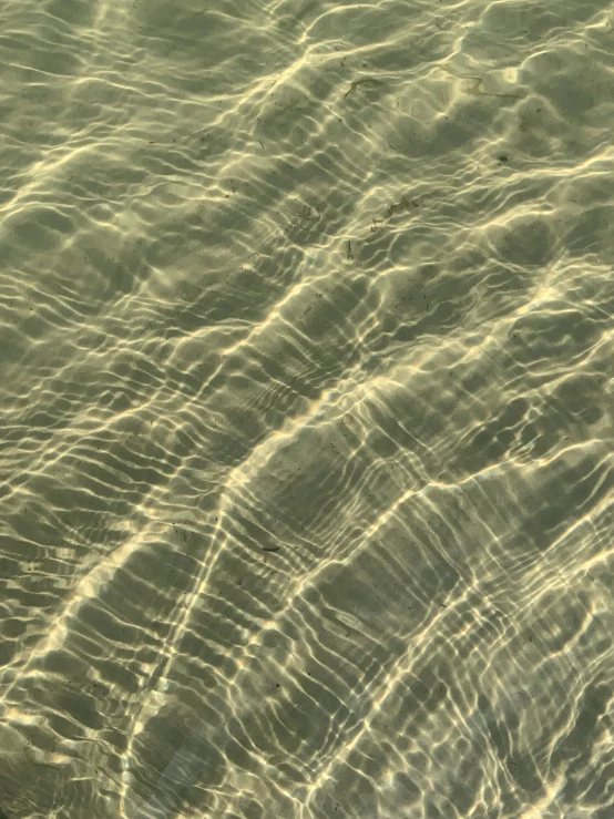 the view from above of water with ripples