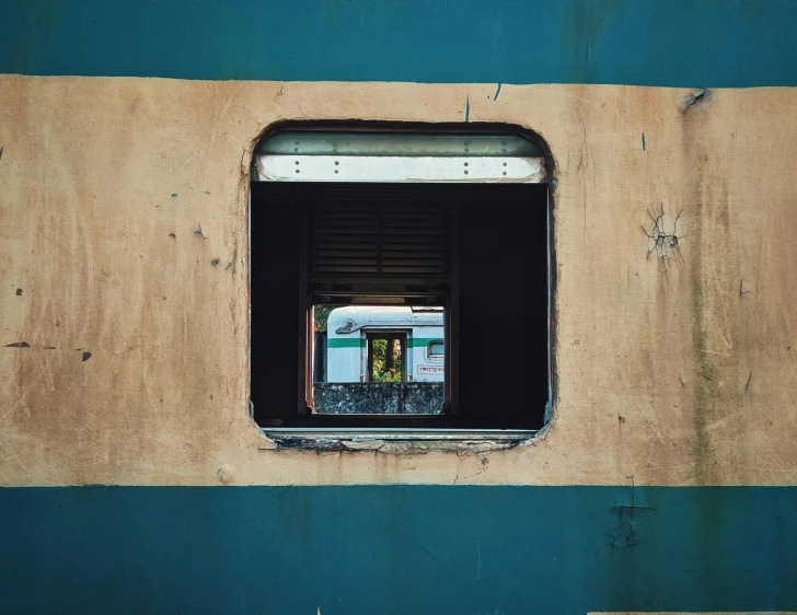 an open window on the side of a building