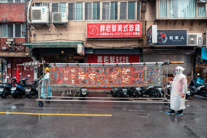 an old street corner has several rows of bikes in front of a store with a lot of locks on it