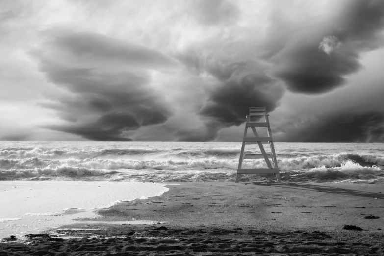 a ladder in the beach on a stormy day