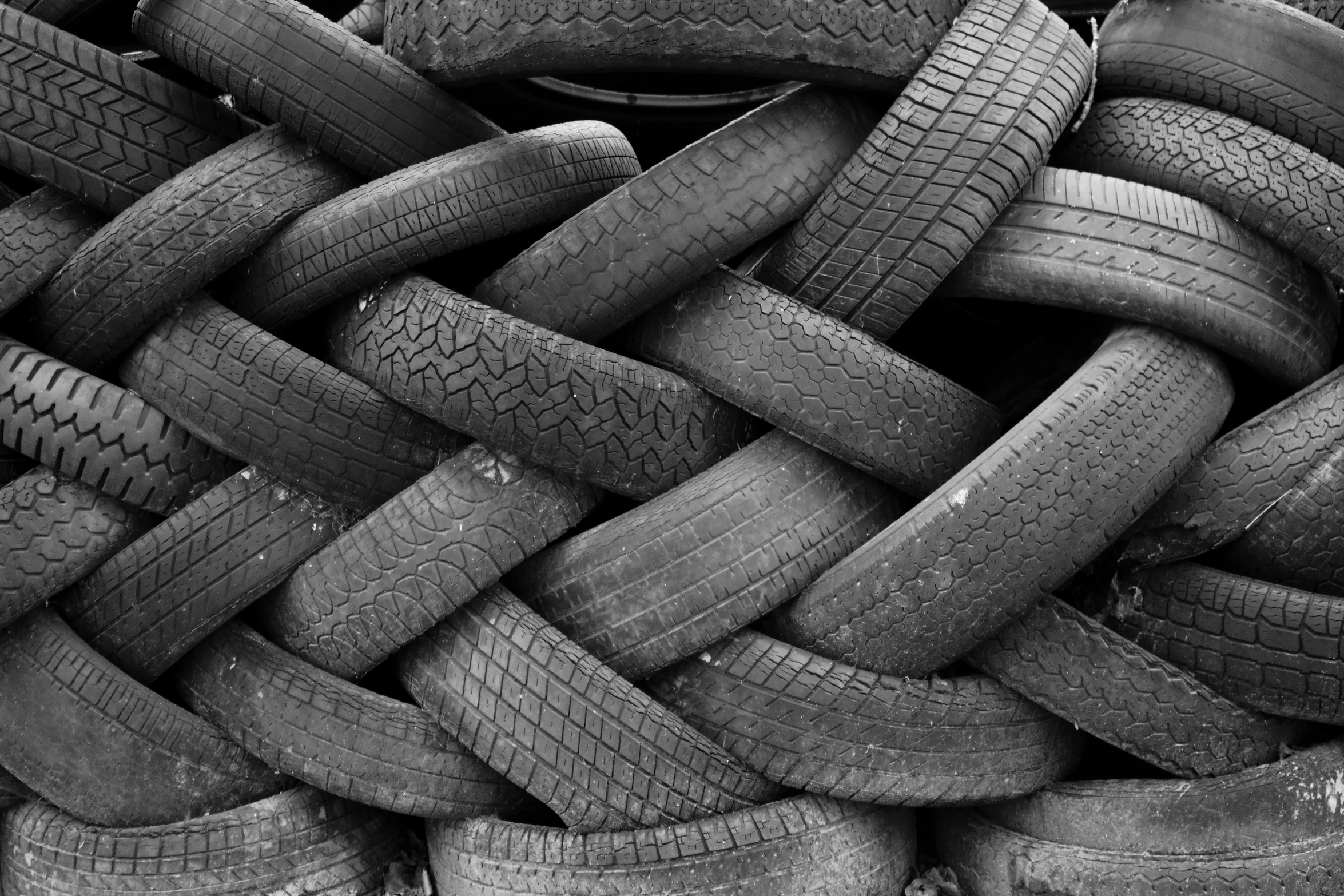 many tires stacked together with one tire