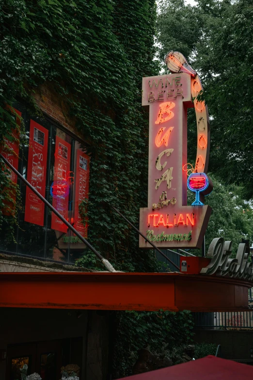 there is a large neon sign in the middle of town