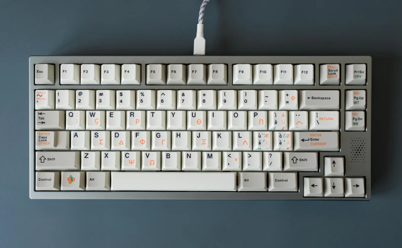 this is an old computer keyboard with several small keys