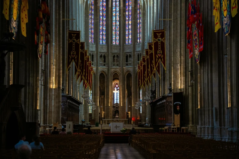 an inside s of a cathedral with lots of stained glass