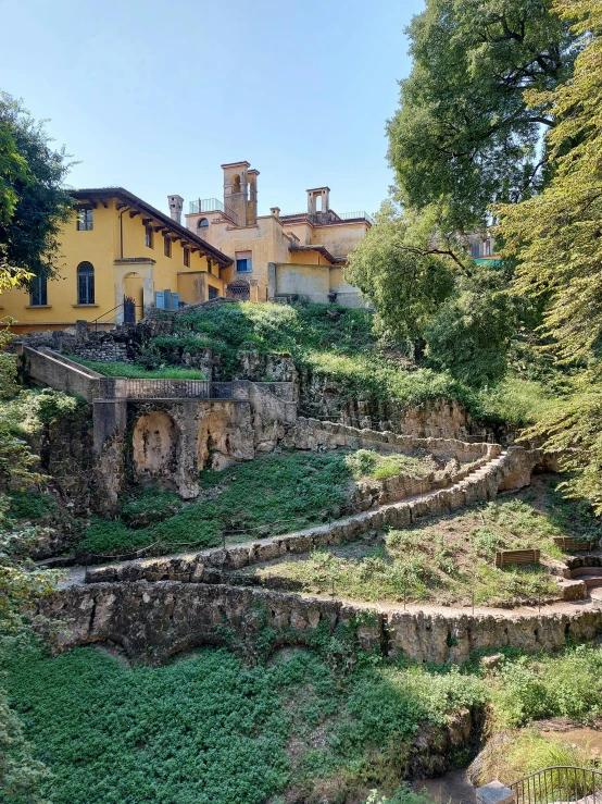 the building is very old and near to many green trees