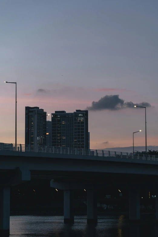 an image of city skyline from the freeway