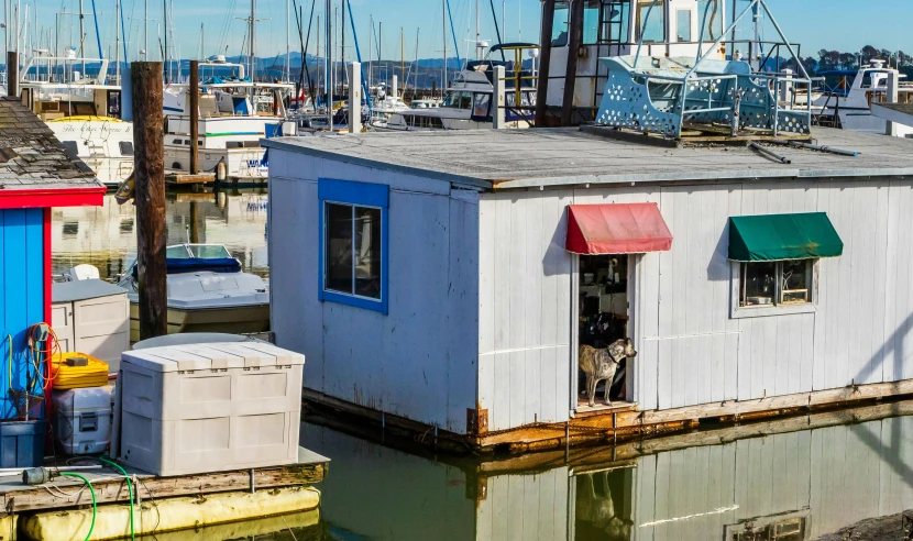 a building is on the side of a body of water