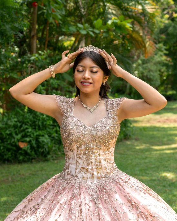 a woman in a dress that is in the grass