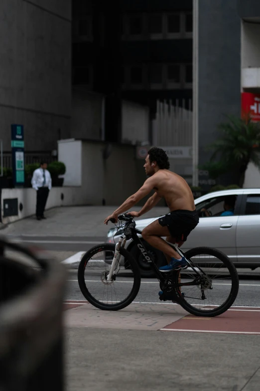 a man is riding a bike in the city