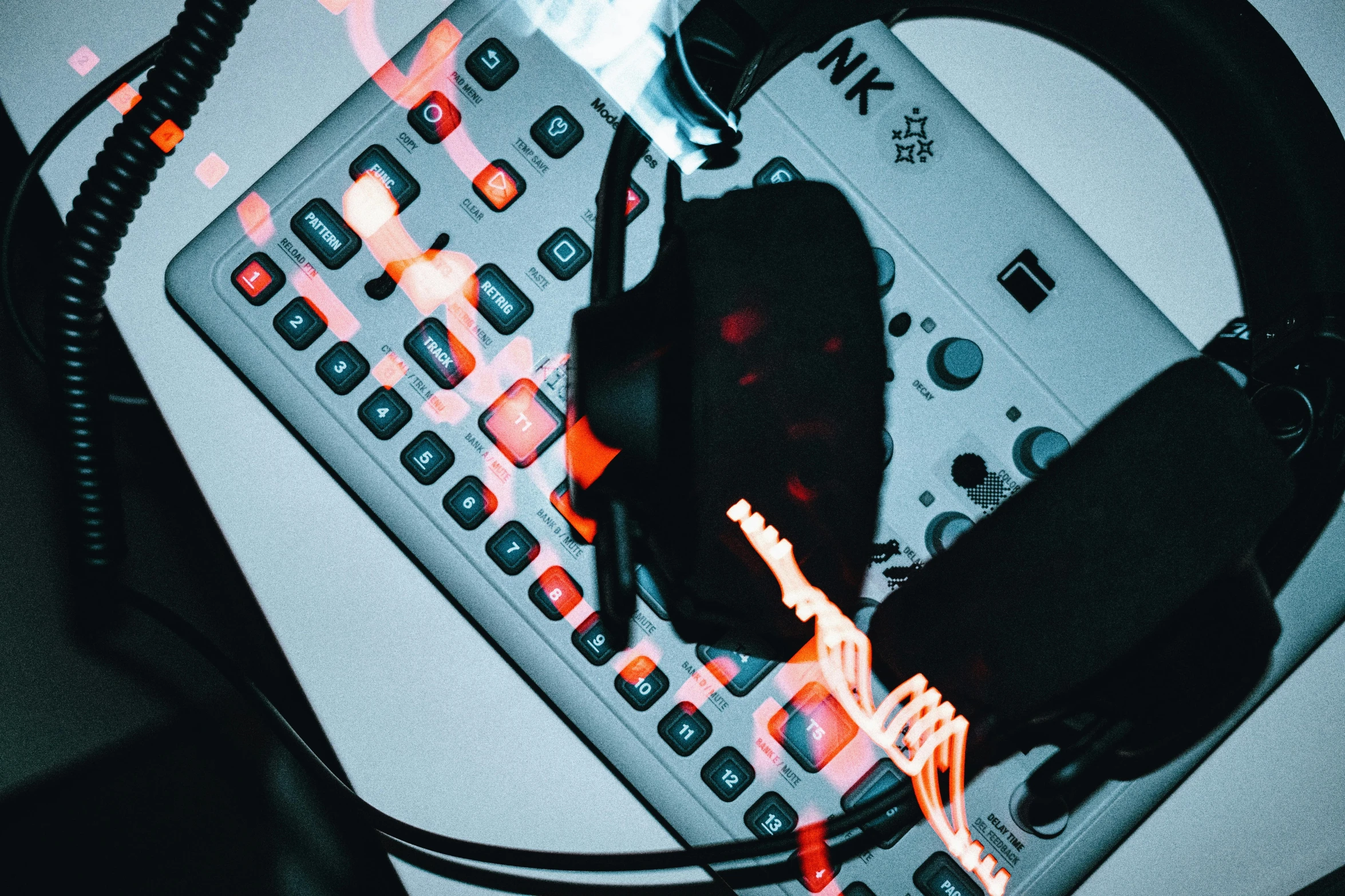 a computer keyboard and some wires on top of it