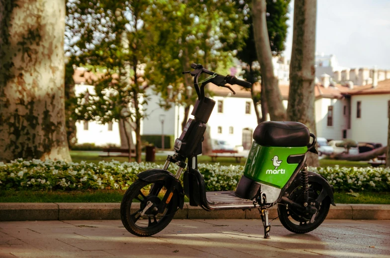 an electric scooter parked on the side of a street