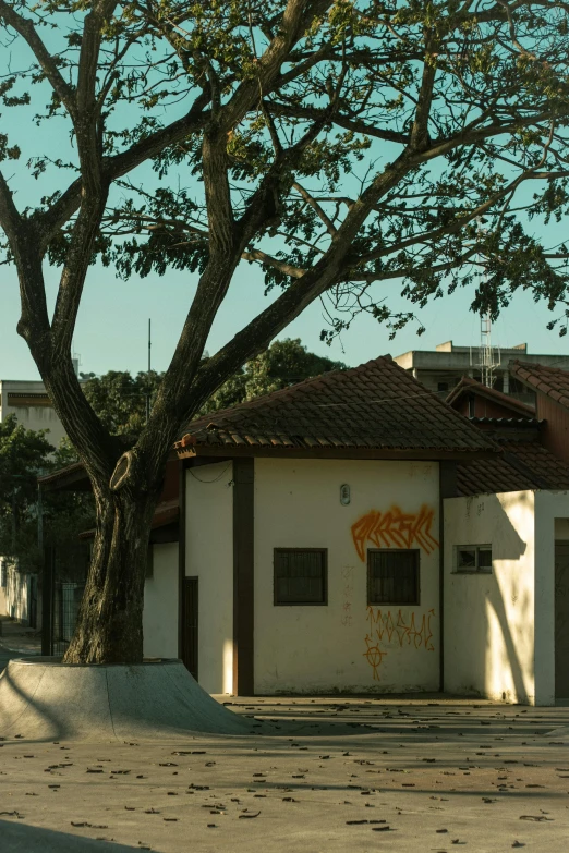 an old building with graffiti written on it