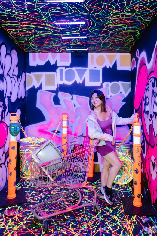 girl sitting on chair inside neon decorated area