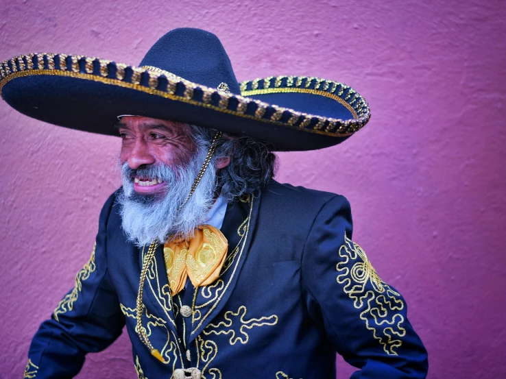 a man in costume poses for the camera