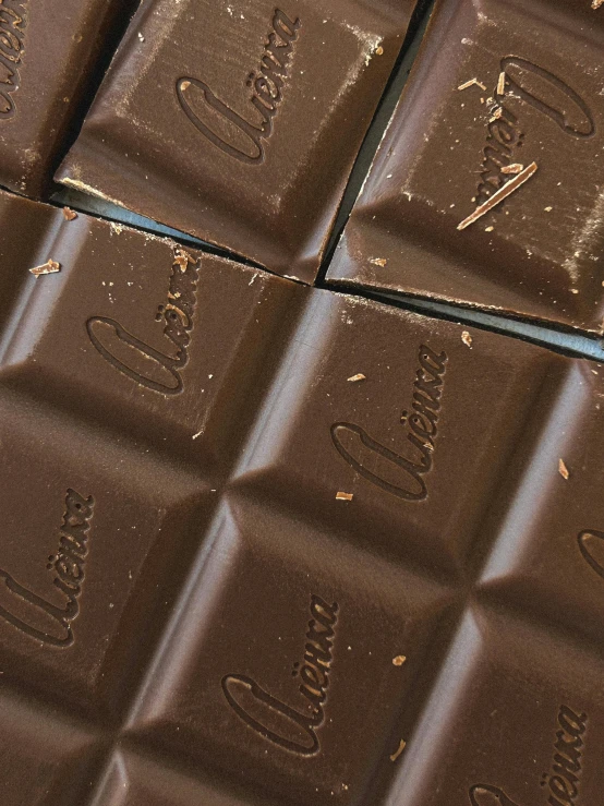 chocolate bar is shown close up on its surface