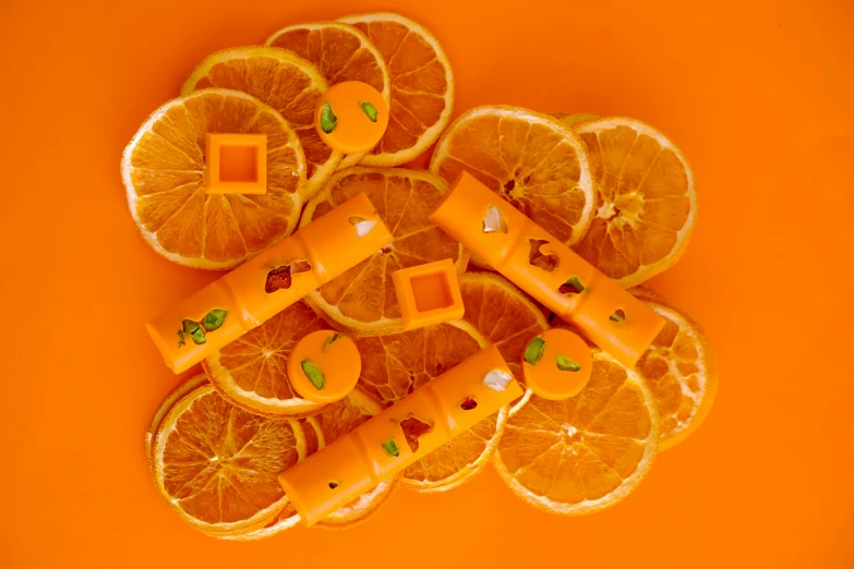 slices of orange sitting in a pile