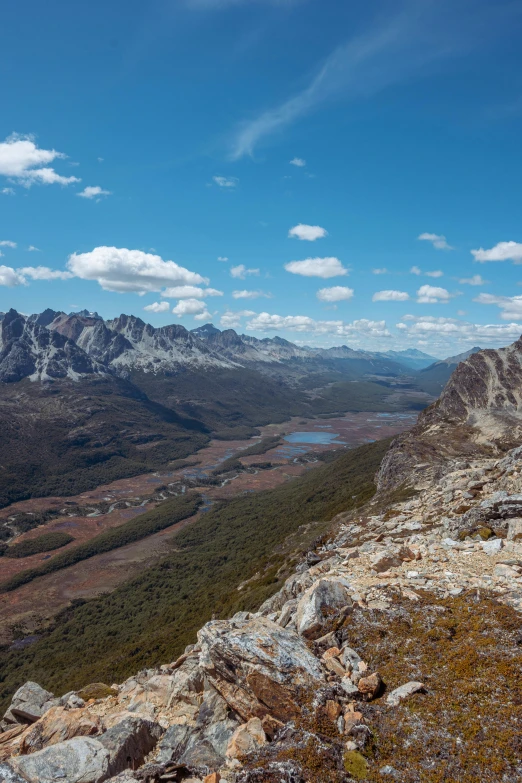 a large mountain view with mountains and trees