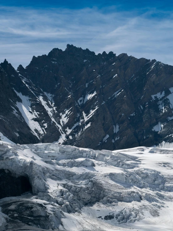 a group of people riding skis on a mountain