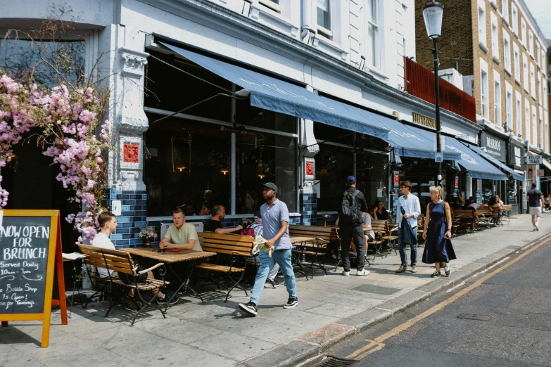 this is an image of a sidewalk outside of a bar