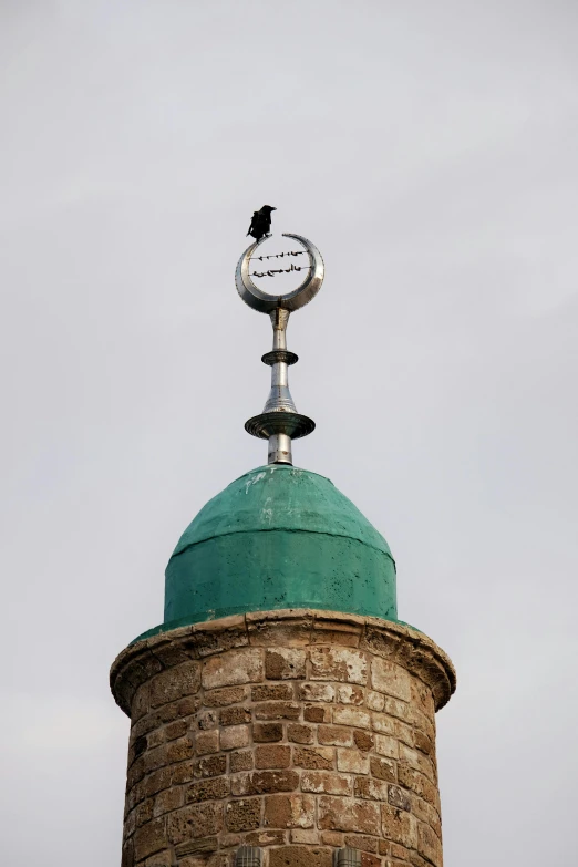 an image of a clock tower on top of a building