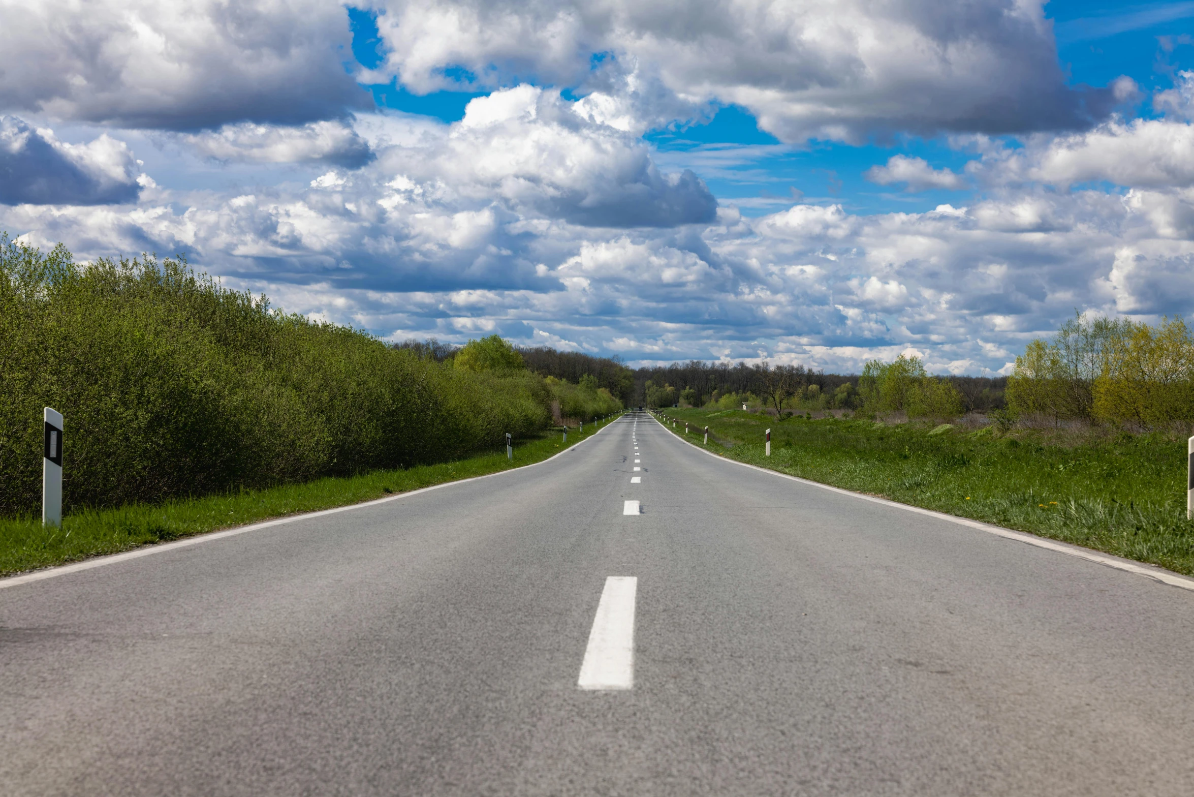 a picture of a empty street in the middle of the day