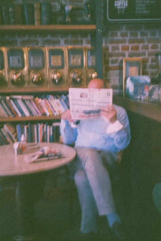 a person with a book on their lap is reading a book