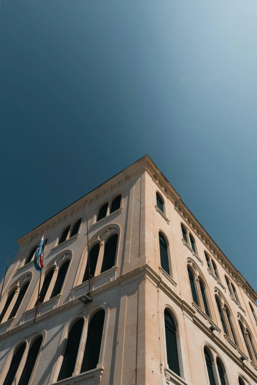 the top part of an old building as seen from below