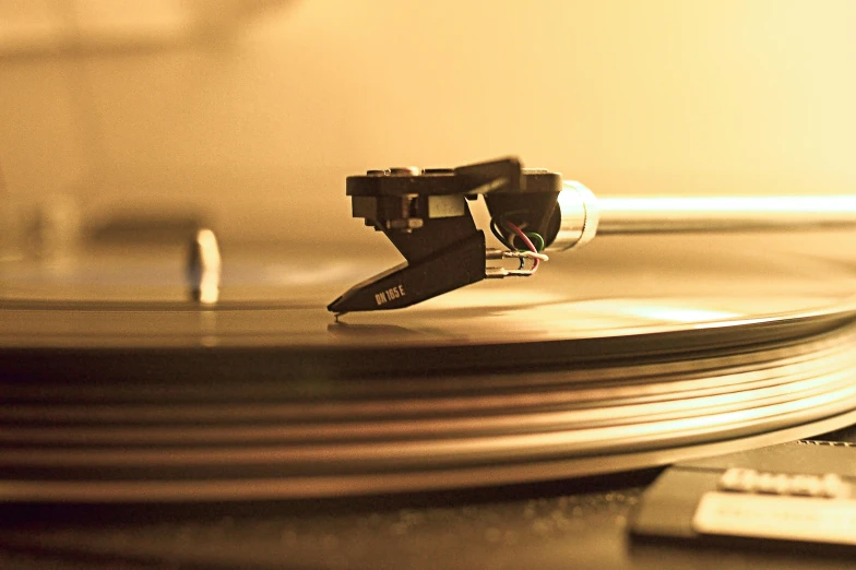 a close up view of a record player that is open