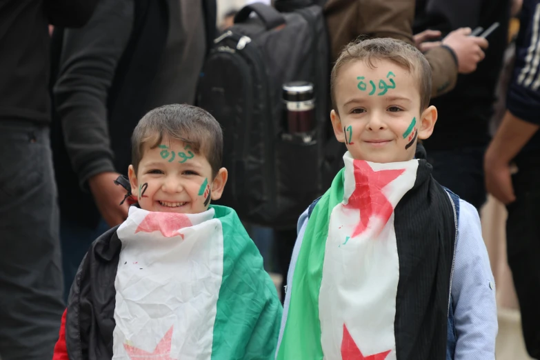 two s show the colors of their scarf