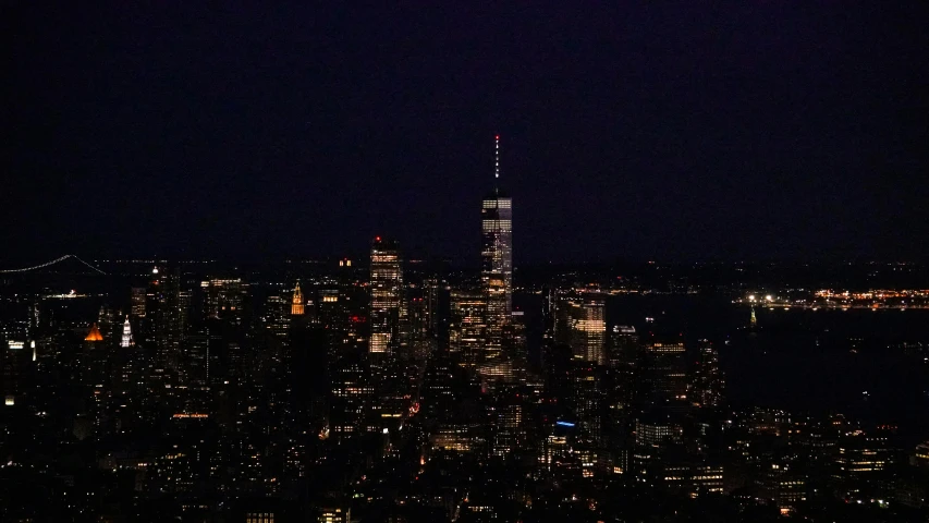 night time view of skyscrs with city lights and lights