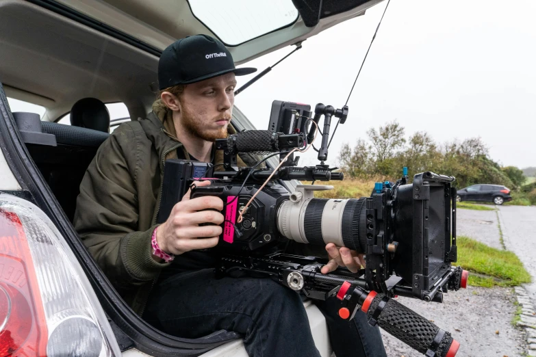 the camera is strapped in the back of a vehicle