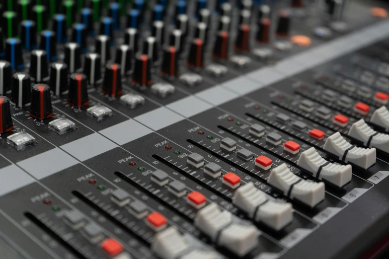 a sound mixing console that is sitting on the floor